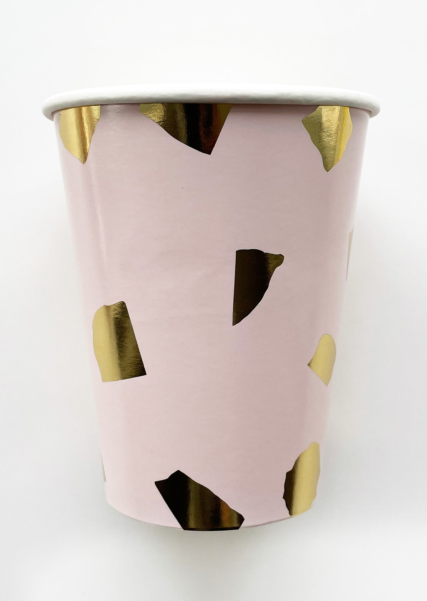 The paper party cups are a pale blush pink colour with gold foil detail.