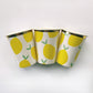 Lemon Party Kit paper party cups. The lemon pattern includes yellow, green and white colours with a metallic gold trim.