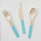 Blue dipped wooden utensils. This cutlery set includes knives, spoons and forks.