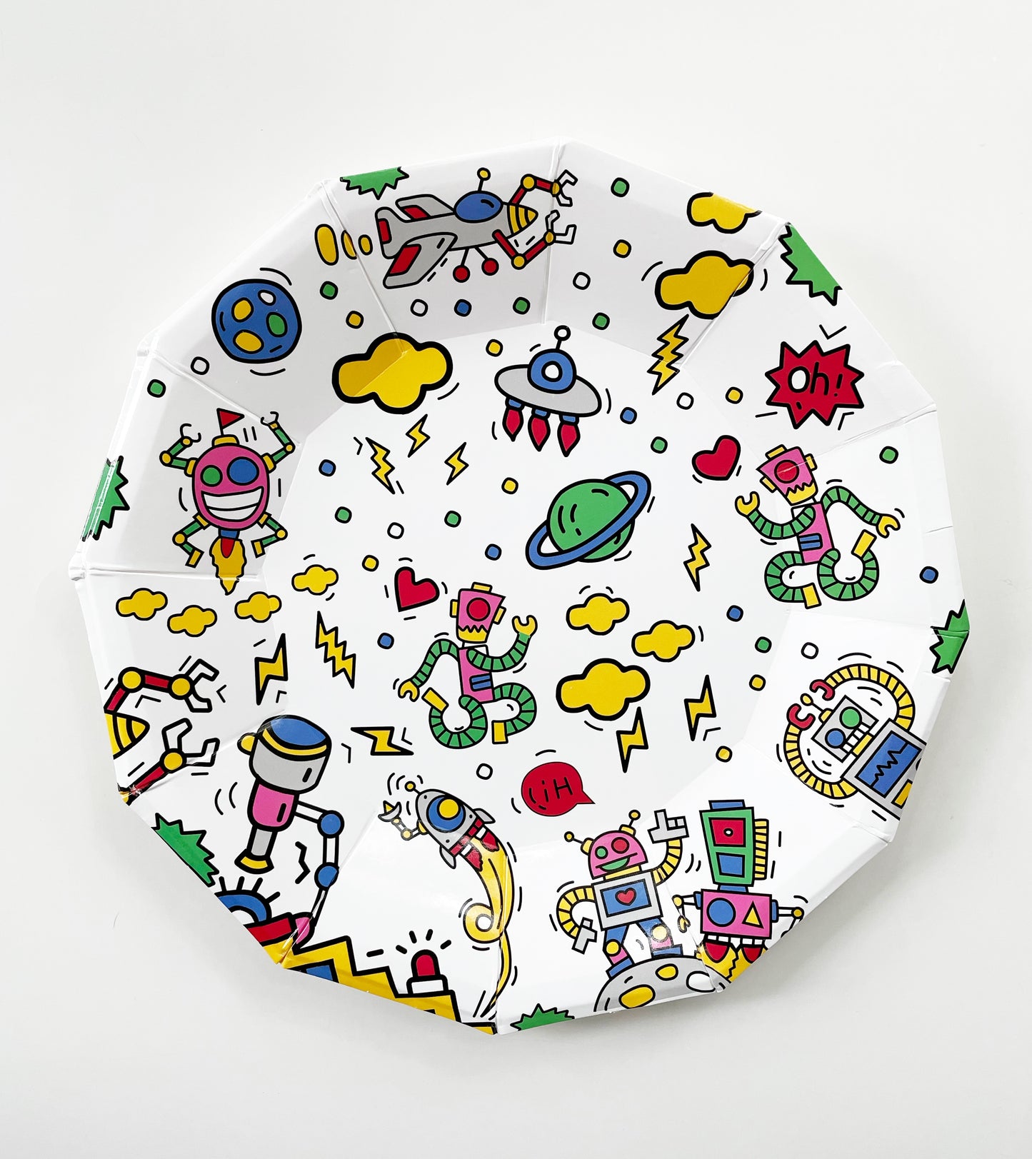 The large robot paper party plates are in the shape of a dodecagon. The robot pattern includes planets, robots, spaceships and clouds in green, blue, red, yellow and pink colours.